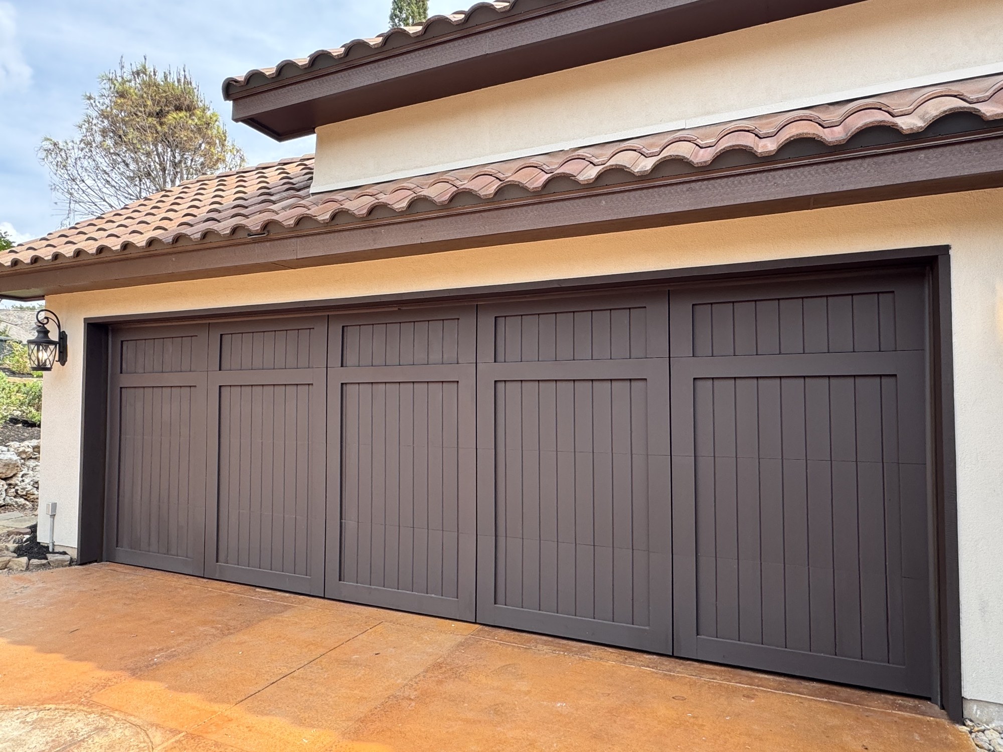 Client’s 22-foot wood garage door installation
